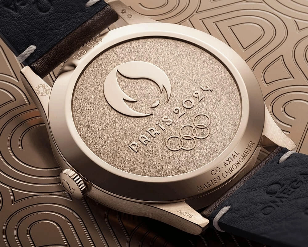 The OMEGA Paris 2024 Bronze Gold Edition Pays Tribute to Olympic Glory - Cortina Watch Singapore